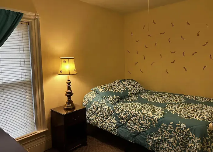 Falls Retreat: Riverside Downtown Getaway